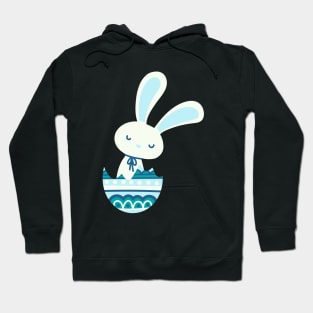 Easter rabbit in a pastel and dark blue egg shell. Hoodie